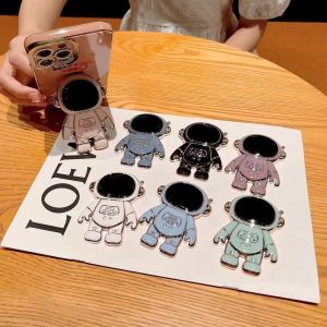 ตัวตั้งโทรศัพท์รูปนักบินอวกาศ 3 มิติพับได้ ติดหลัง ตัวตั้งโทรศัพท์แบบตั้งโต๊ะ น้ำหนักเบา ขนาดเล็ก สำหรับใช้ในชีวิตประจำวัน