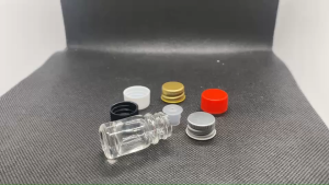 ขวด 5 มล.(12ใบ) แก้ว กลมใส +จุกมีรู/จุกตัน+ฝา 18 mm. (น้ำหนัก=0.312kg.) 07#18