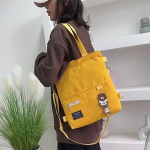 QNQN 2025 กระเป๋าสะพายสุภาพสตรี Canvas Solid Color กระเป๋าสะพายไหล่ Outdoor Communication กระเป๋าผ้าใบแบบพกพาสำหรับนักเรียน กระเป๋าสะพายสุภาพสตรี กระเป๋าสะพายสุภาพสตรี กระเป๋าสะพายสุภาพสตรี