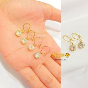 Anting Titanium Anti Karat: Aksesoris Fashion Wanita Elegan & Berkualitas