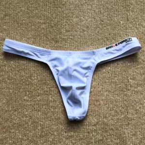 กางเกงชั้นในชายผ้าไนลอนลื่นเอวต่ำสุดเซ็กซี่สำหรับเยาวชน กางเกงชั้นในชายทรง T สำหรับผู้ชาย กางเกงชั้นในชายไร้ตะเข็บ ทรงสีพื้น ใส่สบาย