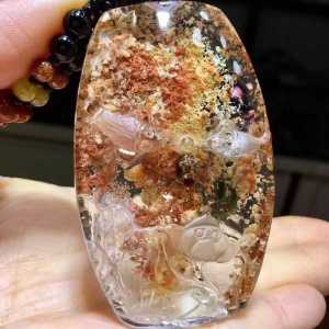 The Golden Chrysanthemum Ghost Treasure Basin Brazilian Old Mine Pure Natural Ghost Pendant with charming scenery pure white body crystal clear exquisite craftsmanship and breathtakingly beautiful. Dimensions: 60*38*14mm