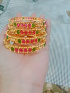 PREMIUM QUALITY MATTE FINISH KEMP STONE WITH BEAUTIFUL PEACOCK DESIGNS BANGLES 2 PAIR.