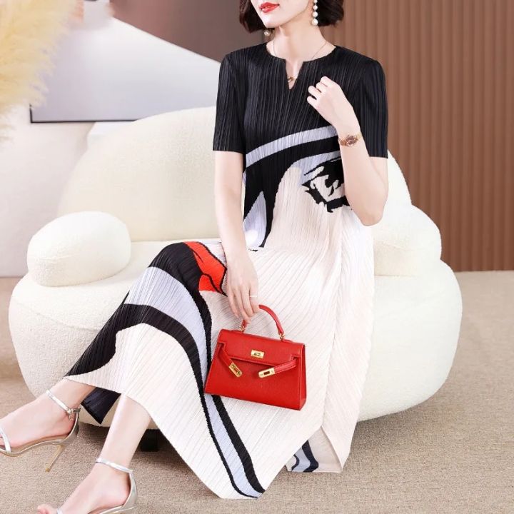 Pleated retro tie-dye sweet temperament fringed skirt medium and long versatile temperament age-reducing summer Korean version high waist