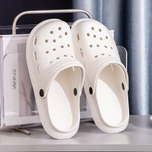 รองเท้าแตะพื้นแบนแบบสวมหัว EVA สำหรับผู้หญิงในช่วงฤดูร้อนกลางแจ้ง รองเท้าแตะแบบสวมหัวแบบป้องกันการลื่น สีขาว รองเท้าชายหาดแบบป้องกันการลื่น