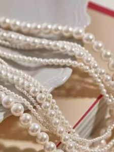 Elegant round Pearl Necklace for Women Lightweight Clavicle Chain Stylish Layering Small Bead Sweater Chain Fashion Jewelry