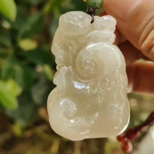 Crafted as Ruyi with Money Pendant on Yellow Icy High Quality Natural Type A Jadeite Jade certificate weighs 35.57 grams measurement 48.3 * 30.9 * 14 mm (pendant385)