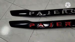 คิ้วฝากระโปรงท้าย สีดำเงา // โลโก้แดง ดำเงาติดเองได้ไม่ง้อช่าง ไม่ยุ่งระบบไฟ ปาเจโร่ 15 - 23 พายเชียง