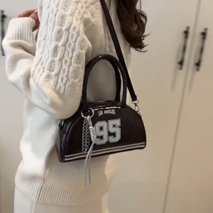 MOUSSON กระเป๋าบอสตันสไตล์เกาหลีแมทช์ลุคง่าย ins กระเป๋าสะพายไหล่โบว์ลิ่งความจุสูงแฟชั่นกีฬาสไตล์อเมริกัน