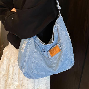 กระเป๋าสะพายข้างผ้าเดนิมความจุขนาดใหญ่สำหรับผู้หญิง 2025 กระเป๋าสะพายข้างแฟชั่นใหม่สำหรับใส่ไปเรียน กระเป๋าสะพายไหล่เดียว INS กระเป๋าเดินทางสำหรับนักเรียน