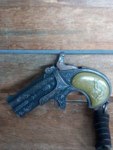 mainan gantungan kunci pistol diecast metal ring caps doblis antik vintage