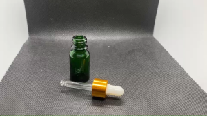 ขวด 10 มล.(6 ใบ)แก้วสีเขียวขุ่น + ฝาสีทอง+บีบขาว+หลอดแก้ว 09#18