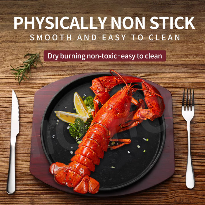 Sizzling plate easy to clean and wearresistant cast iron wooden bottom