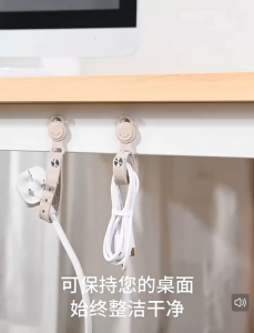Silicone tape magnetic cable organizer for desk with cable management clips and holder for neat arrangement.
