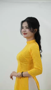 Áo dài vàng Chuồn Chuồn dáng ôm truyền thống vải gấm tơ cổ cao hoa văn tay lỡ - Áo dài Ngọc Mai