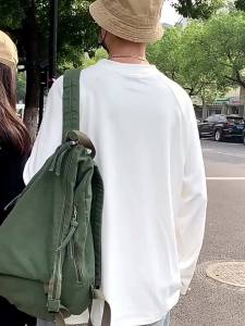 ญี่ปุ่นบุคลิกภาพสามเหลี่ยมกระเป๋านักเรียนโรงเรียนมัธยมวิทยาลัยกระเป๋าเป้สะพายหลังผู้หญิงแฟชั่นสบาย ๆ สีทึบล้างผ้าใบกระเป๋าสะพายคู่สำหรับผู้ชาย