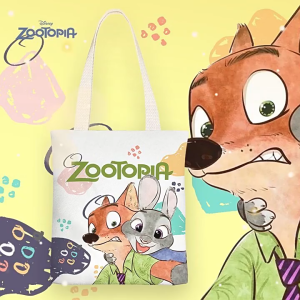 กระเป๋าผ้าแคนวาสสะพายไหล่ลายการ์ตูนน่ารักสำหรับเด็ก Zootopia สำหรับนักเรียนประถมและมัธยม กระเป๋าติวเตอร์/กระเป๋าถือสำหรับชั้นเรียน/กระเป๋าผ้าแคนวาสสะพายไหล่