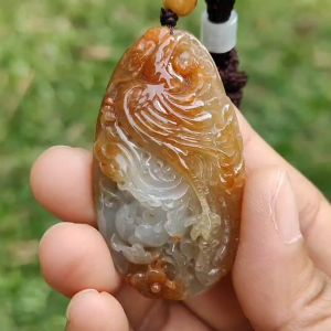 Rare Light Green with Red Natural Type A Jadeite Jade crafted as Phoenix to use as Pendant certificate weighs 27.45 grams measurement 52.3 * 28.5 * 12.5 mm (pendant279)