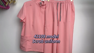 Single Piece【STOCK】 short-sleeve scrub top with zip collar and pockets for medical or salon use.