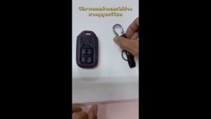 เคสหนังแท้หุ้มรีโมทซองหนังแท้ใส่กุญแจกันรอยกระแทก สีดำด้ายแดง (車用攝像頭準確カメラ รสชาติเสียง ดอกเบี้ย สีดำด้ายแดง)