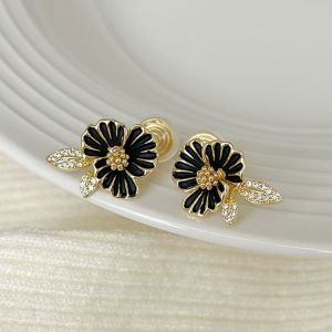 KAIROS 14k Gold Black Daisy Countryside Clip-On Earrings Adjustable Coiled Ear Clips