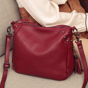 กระเป๋าผู้หญิงหนังแท้ทรงถังแฟชั่นสำหรับฤดูร้อนปี 2024 กระเป๋าสะพายข้างหนังนิ่มพร้อมสายรัดไหล่เดี่ยวและหัวเข็มขัด