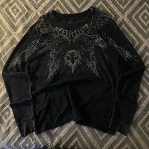 Fashionable mens autumn personalized skull letter print micro elastic comfortable long sleeved T-shirt outdoor street style top