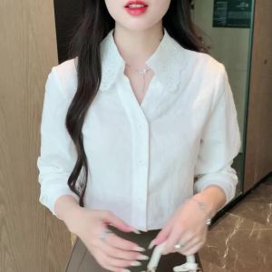 AMMIN 2024 Autumns new commuter fashion embroidered hollow-cut lace lapel long sleeve textured cotton blouse for womens Korean version is a simple and elegant blouse in a solid color