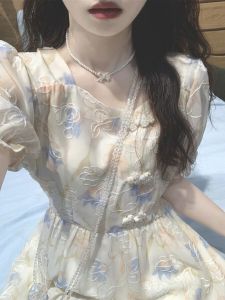 ชุดเดรสยาวแขนพองลายดอกไม้สไตล์วินเทจสำหรับผู้หญิงในช่วงฤดูร้อนปี 2025 ชุดเจ้าหญิงหลบหนีในช่วงหยุดดื่มชา