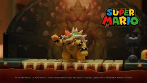 Nintendo Super Mario Deluxe Bowser Battle Playset with Lights and Sounds 2.5 Inch Bowser Action Figure Included