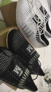 Sepatu casual sneakers slip slip on wanita bertali motif eagle M hitam putih karet lentur kanvas kaki anti gerah terbaru kekinian