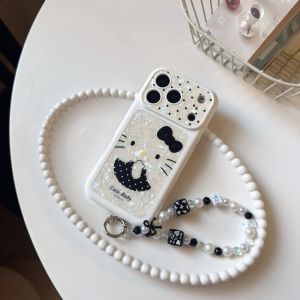 Sanrio | Ốp Điện Thoại Hello Kitty Họa Tiết Vỏ Sò Hàn Quốc Chấm Bi Đen Dành Cho iPhone 18/17/16/15 Pro Max Kèm Dây Đeo Chống Sốc Chống Xước