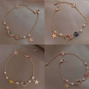 OR🧸 Gelang Liontin Bintang Dan Bulan Berkilau Fashion Korea Langit Berbintang Empat Warna Yang Mempesona Memakainya Bersinar Menunjukkan Keanggunan Dan Vitalitas Yang Berkilau COD