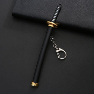 Bandai | Clothing and accessories related to the One Piece anime including a sword-shaped keychain made of metal key accessories