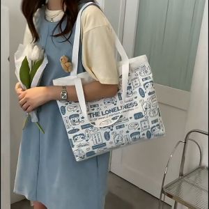 Cartoon canvas bag versatile Japanese and Korean large capacity handbag artistic and cute shoulder bag printed tote bag multifunctional tote bag multiple styles to choose from