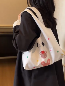 NIkyLundun   น่ารักการ์ตูนลายผ้าใบสะพายไหล่ใต้วงแขนกระเป๋าโท้ทใหม่ออกแบบเฉพาะกลุ่มความจุขนาดใหญ่พร็อพ