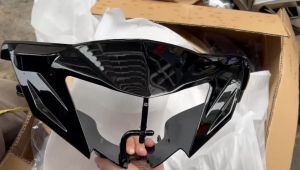 Đầu đèn pha hay bợ cổ trước 1 càng xe Exciter 135 5 số đời 2011 đến 2014