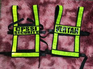 Reflective safety vests for security personnel with adjustable straps and bright yellow reflective strips.