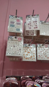 Floral-themed nail art stickers in assorted designs