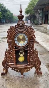 Đồng hồ để bàn gỗ mun đuôi công