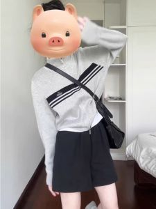 Stylish Two-Piece Suit for Women: Knit Sweater with Stripes and Wide-Leg Shorts – Youthful and Fashionable Autumn Outfit
