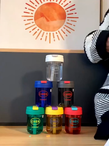 Simple and stylish plastic cup cute mini portable water bottle with straw suitable for students and couples.