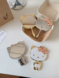 Gương Trang Điểm Hello Kitty Thiết Kế Đáng Yêu Màu Sắc Sang Trọng Gương Cầm Tay Mini Cute Có Tay Cầm Dài Và Gập Gọn Để Bàn TIDO TI DO