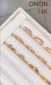 Cincin emas asli kadar 700 70 16k crown mahkota solitaire listing bunga branded cartie permata 1 terbaru