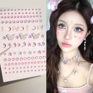 สติกเกอร์เพชรเทียมบนใบหน้าแบบผสม Dorisna สำหรับผู้หญิงรูปลอกใบหน้ารูปดาวพระจันทร์และผีเสื้อรูปกุหลาบสำหรับเทศกาลปาร์ตี้กากเพชรตกแต่งใบหน้าสติกเกอร์แต่งหน้าเป็นประกาย