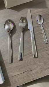 Four-piece set of knives spoons forks and stainless steel dessert and steakware