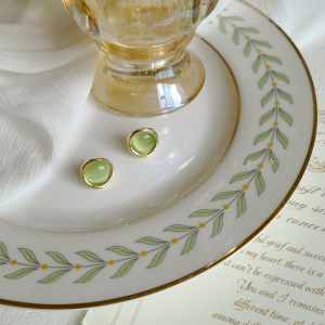 French Style Green Cats Eye Ear Cuff: Fresh And White Enhancing Small Batch Design