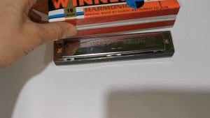 Alat tiup harmonika hero