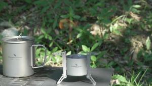 Boundless Voyage Titanium มินิเตาแอลกอฮอล์วิญญาณเตาตั้งแคมป์กลางแจ้งเตาพับยืนวงเล็บ Ti2016C