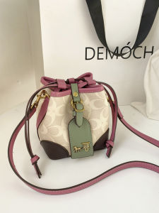 กระเป๋าถือทรงถังผ้าไนลอนสไตล์ยุโรปแบบสะพายข้าง ขนาดเล็ก ดีไซน์เก๋ไก๋สำหรับวัยรุ่น กระเป๋าสะพายข้างแบบลำลอง ปิดด้วยเชือกผูก